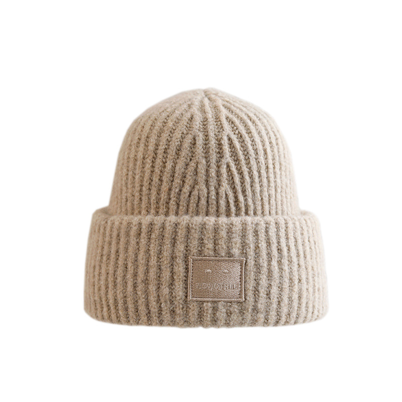 Womens Large Face Logo Beanie  |  Hats Hats Biscuit beige